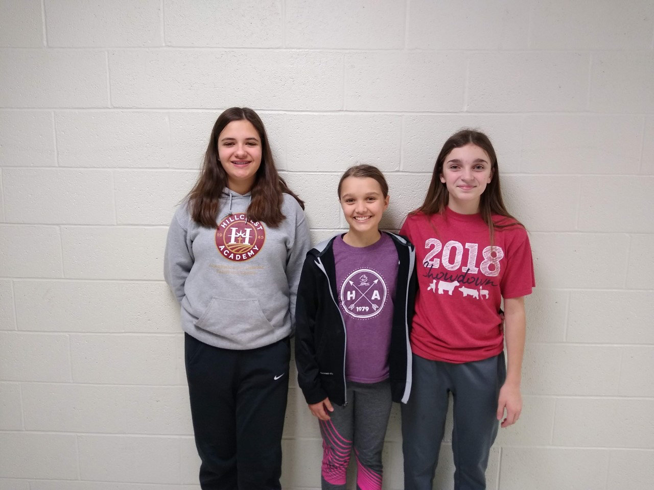 Top novice middle division Mid-Prairie team (from left) Lydia Beachy, Tara Poole and Charlotte Sieren.